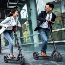 SHOK electric scooters business people riding scooters
