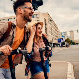 SHOK electric scooters couple riding scooters